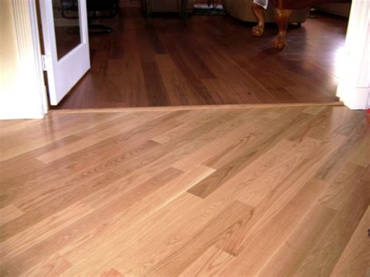 Can Hardwood be installed over laminate?